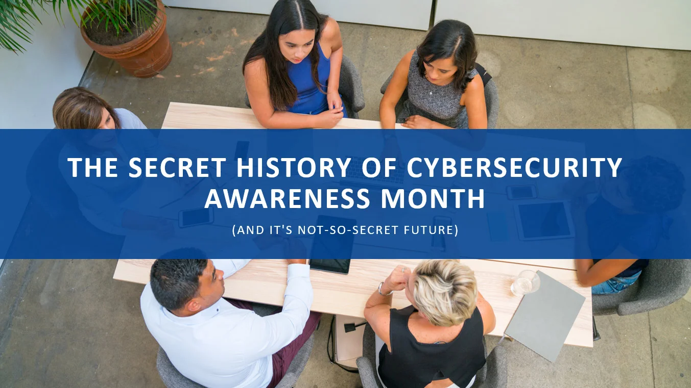 blog1history An image of individuals around a conference table with an overlay stating "The Secret History of Cybersecurity Awareness Month (And its not-so-secret-future)"